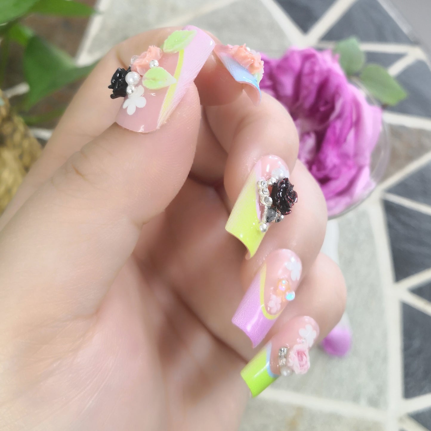 Painted nail art Peony nails on fingertips