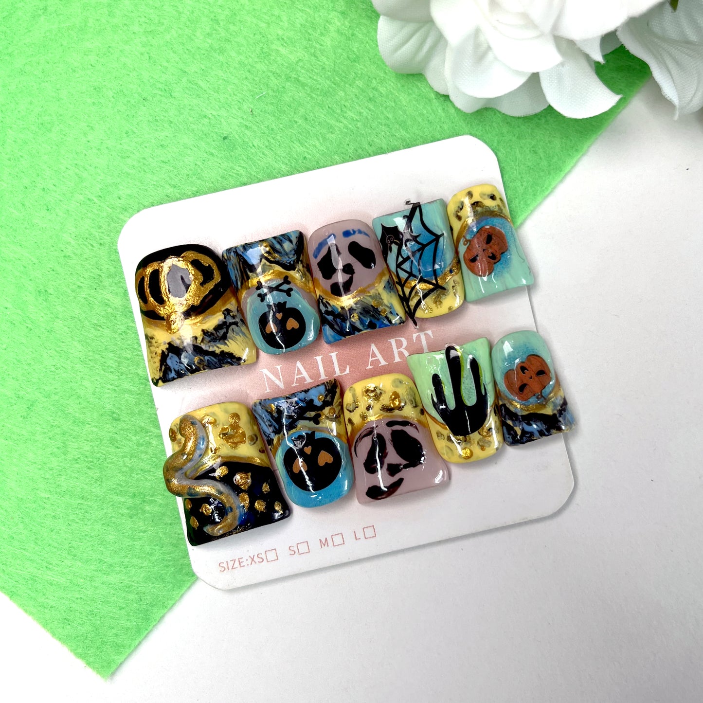 Halloween fantasy nail art stickers featuring pumpkin, skull, and snake elements