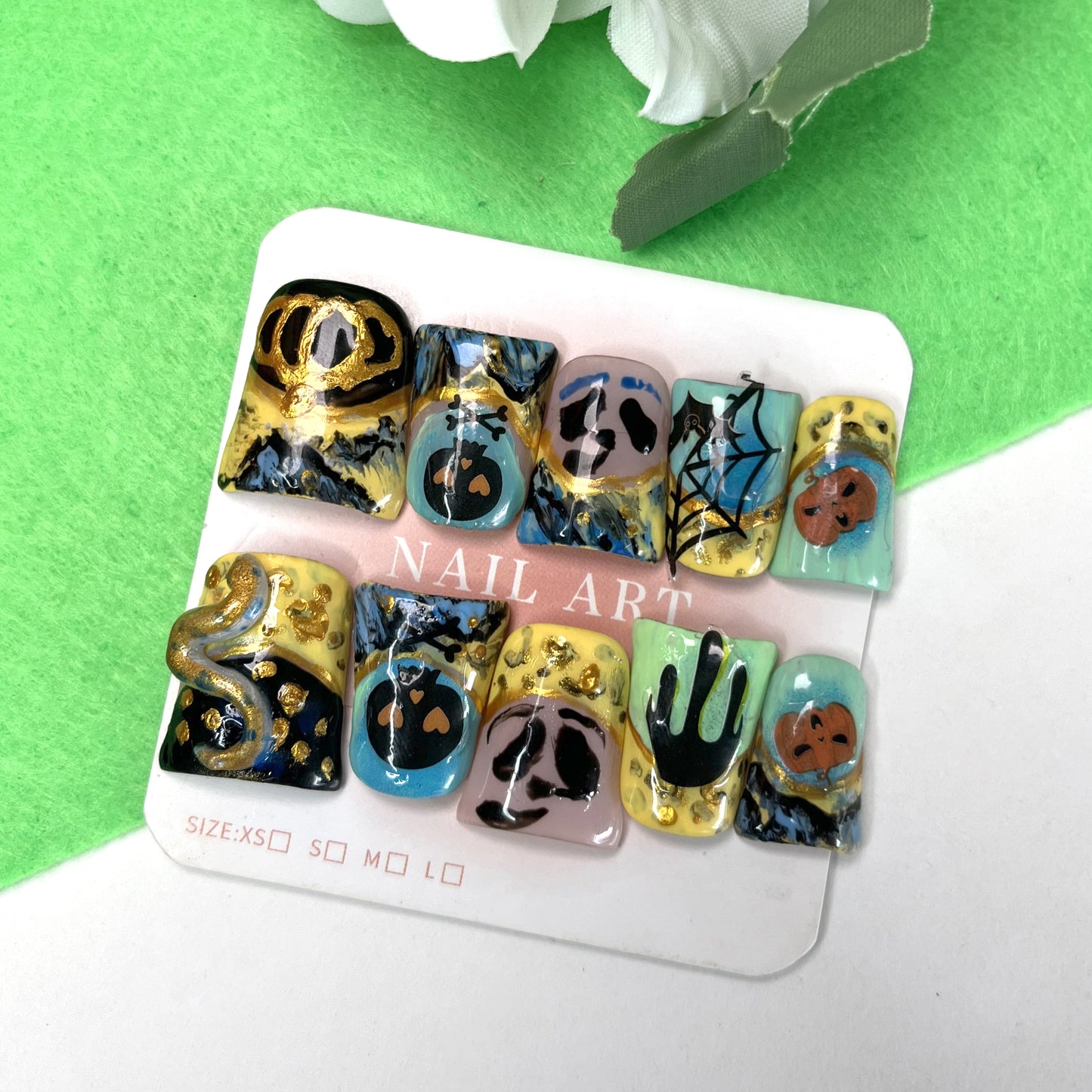 Halloween fantasy nail art stickers featuring pumpkin, skull, and snake elements