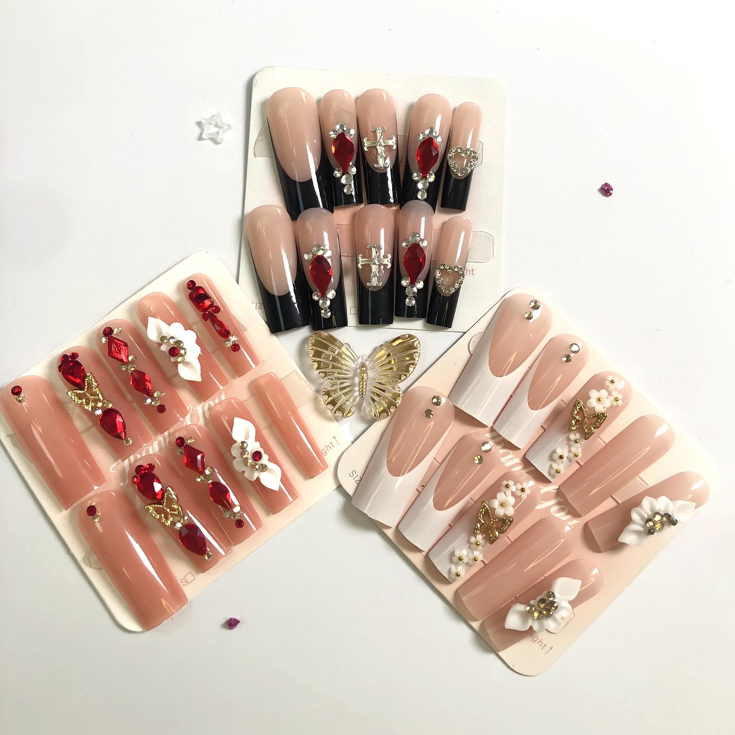 3-piece set, 10 nail tips set of elegant and luxurious wearable press-on nails in nude with stunning black, red and decorative accents