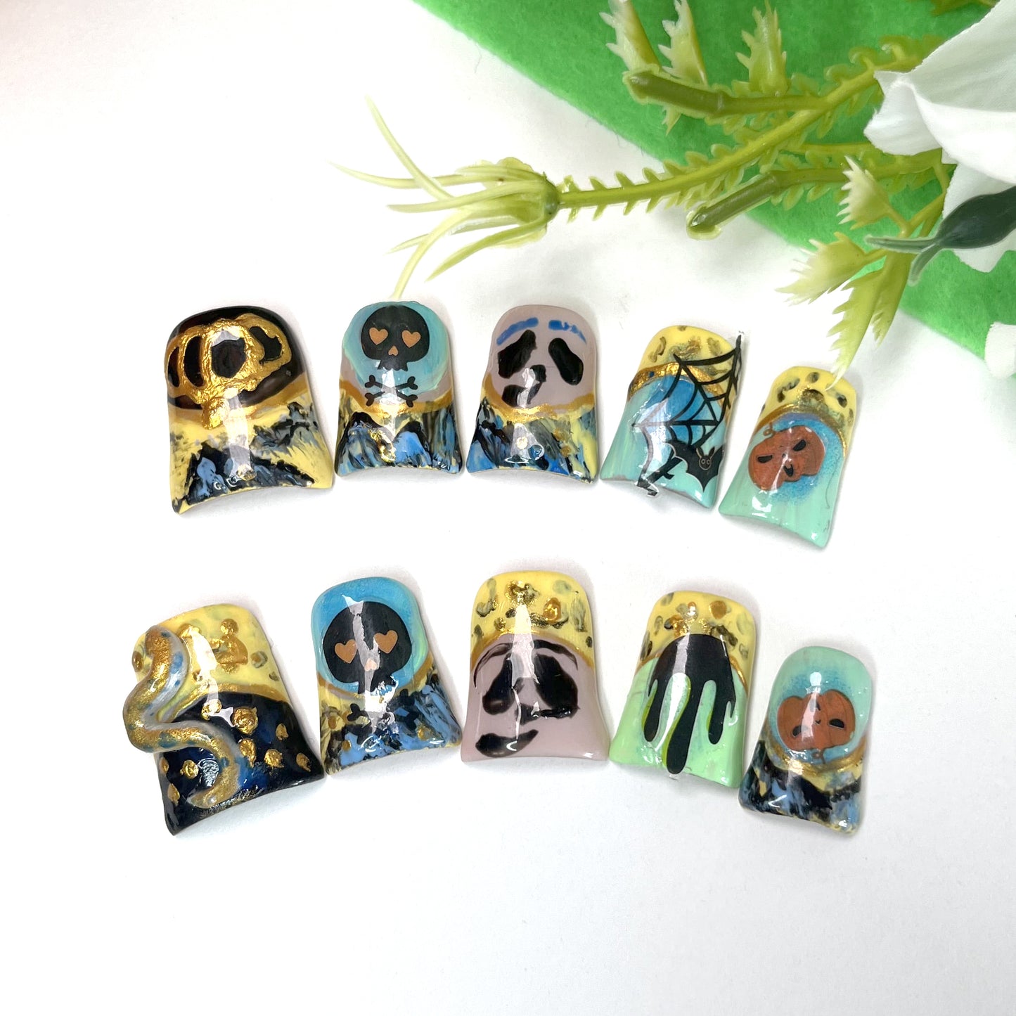 Halloween fantasy nail art stickers featuring pumpkin, skull, and snake elements