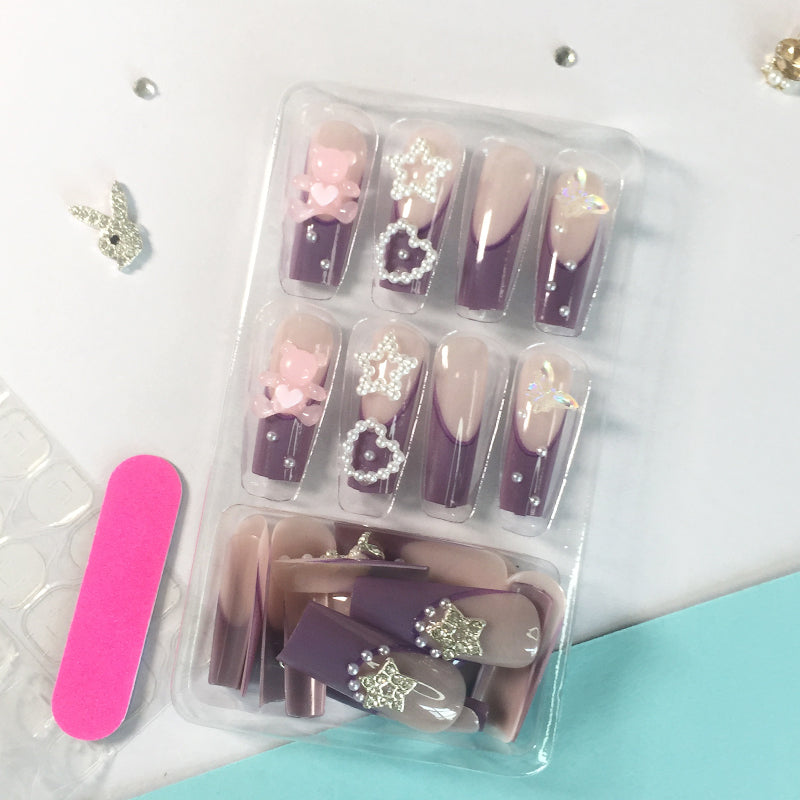 Purple - pink gradient nail stickers, adorned with pearls, stars and bows, encounter a fairy tale on your fingertips.