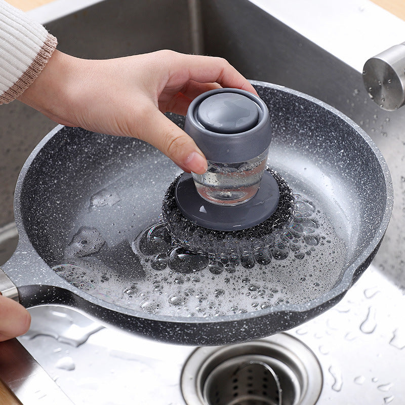 Add liquid to wash the pot, brush the kitchen supplies, the stove cleaning brush, the household steel wool ball cleaning brush, and use a small brush to scrub the pot