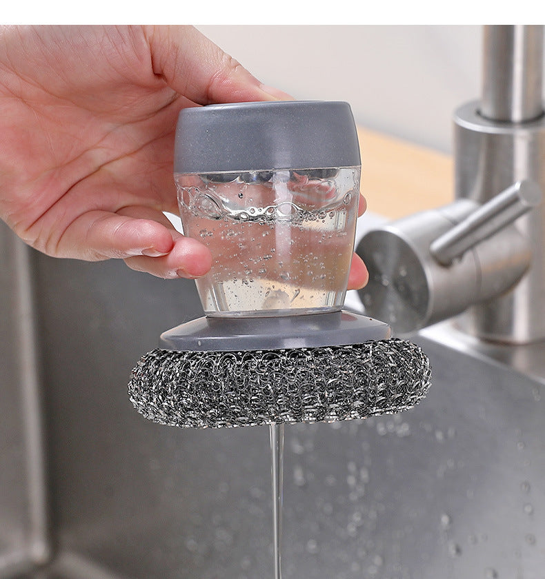 Add liquid to wash the pot, brush the kitchen supplies, the stove cleaning brush, the household steel wool ball cleaning brush, and use a small brush to scrub the pot