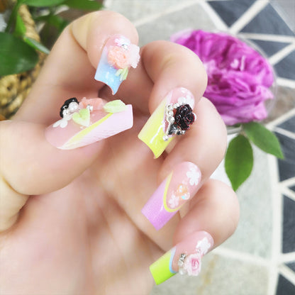Painted nail art Peony nails on fingertips