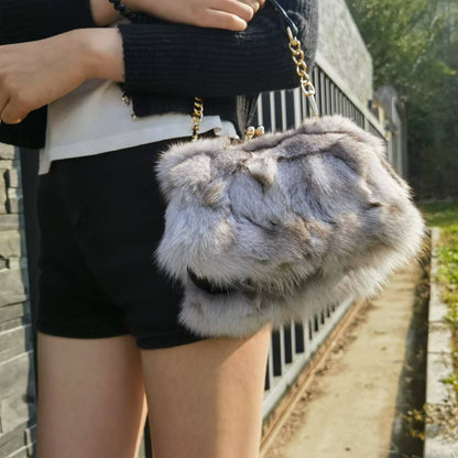 Luxury handbags. Ladies' pleated chain - shoulder bags. High - grade texture. Fluffy wallets. AND real mink - fur handbags.