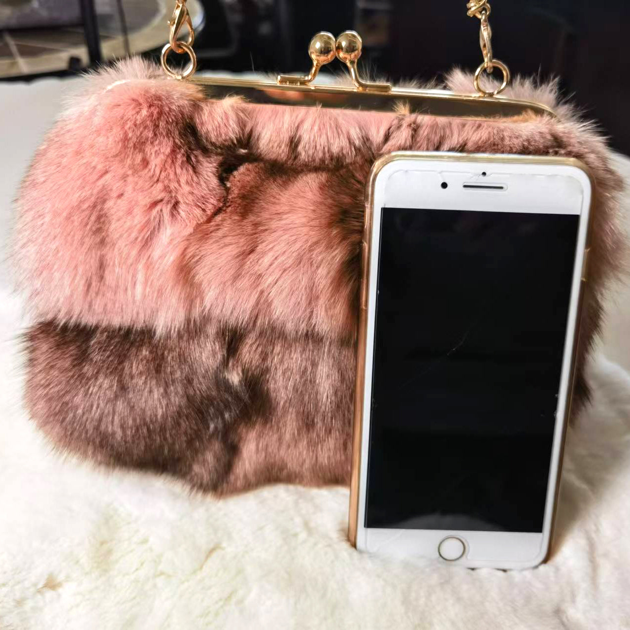 Luxury handbags. Ladies' pleated chain - shoulder bags. High - grade texture. Fluffy wallets. AND real mink - fur handbags.