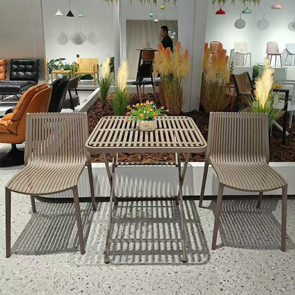 Minimalist modern openwork dining chair, stackable for small apartments, with a backrest.