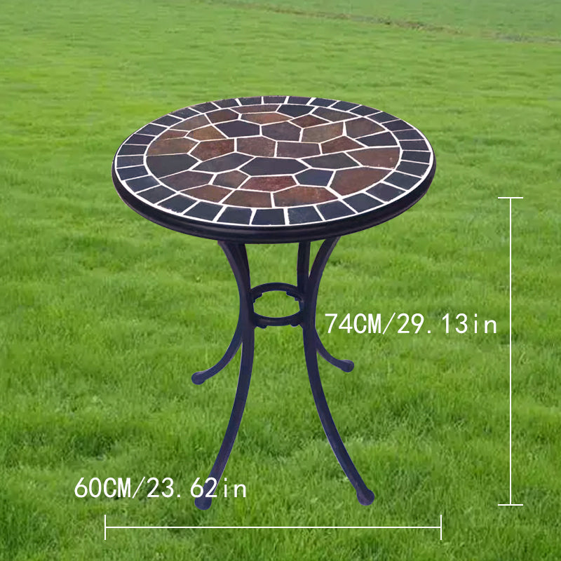 A small round stone table | with a colorful stone - inlaid tabletop and metal legs | an outdoor small round table to start a cozy leisure time.