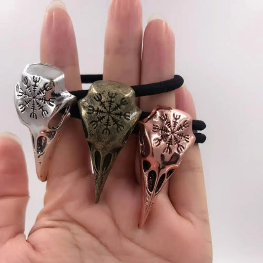 A three - piece set of Gothic dark - style hair accessories with crow skull shapes, which are essential hair accessories for Halloween.