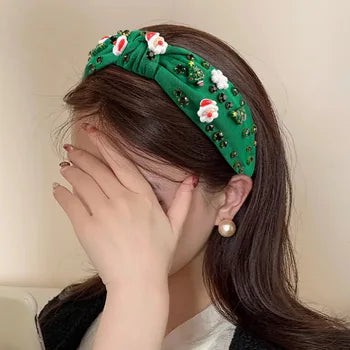 A festive headband decorated with a Christmas hat, a high - quality hair accessory handmade for the holiday seasons in Europe and America, a gift for ladies.