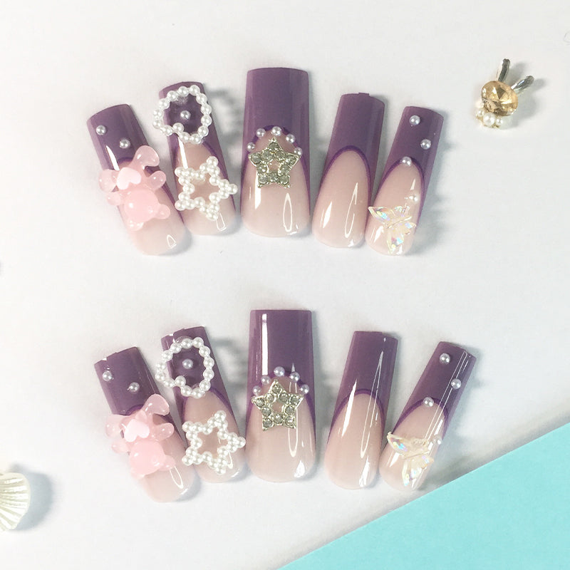 Purple - pink gradient nail stickers, adorned with pearls, stars and bows, encounter a fairy tale on your fingertips.