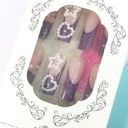 Purple - pink gradient nail stickers, adorned with pearls, stars and bows, encounter a fairy tale on your fingertips.