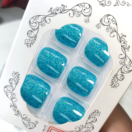 24-piece set: Holiday-inspired blue glitter toenails! Rhinestone-embellished nails