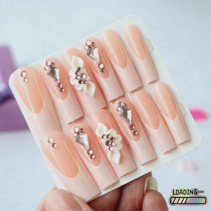 24 nail tips Pink and nude gradient nail art, golden butterflies and white flowers embellish delicate fingertips